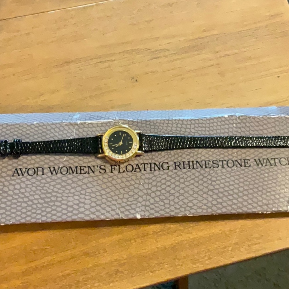 Genuine Vintage 1991Avon Gold tone rhinestoned bezel Case Watch with Black Strap